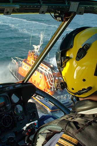 SAR pilot alongside lifeboat